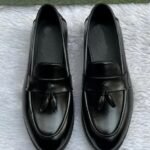 mocassins à pompons